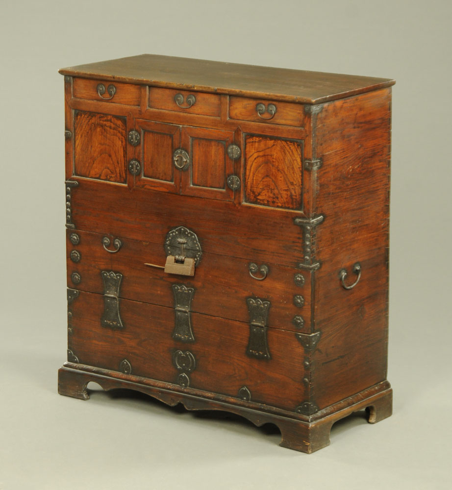 A Chinese Paulownia wood blanket chest, with iron handles hinges and mounts,