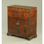 A Chinese Paulownia wood blanket chest, with iron handles hinges and mounts,