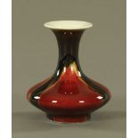 A Chinese flambe transmutation glaze Sang de Boeuf vase, blue printed mark to base. Height 12 cm.