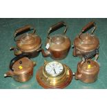 4 copper kettles and a bulk head clock