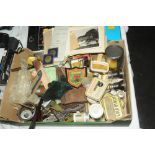 Box of clock parts, binoculars, photographs,