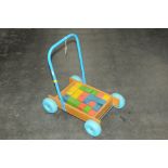 Child's push along toy and building blocks