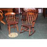 A rocking chair and a pine carver chair