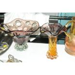 Two coloured glass vases,