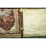 Two rectangular fringed patterned rugs