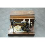 Cased singer sewing machine