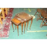 Nest of three tables with glass tops