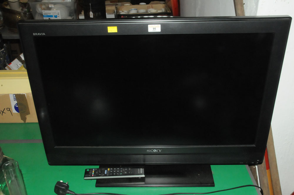 Sony flat screen television set with remote control