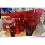 Box of Cranberry glass jugs and glassware