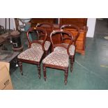 Four Victorian balloon back upholstered dining chairs