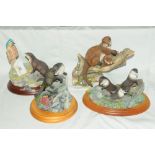 Collection of four Border Fine Art and Country Artist otter ornaments