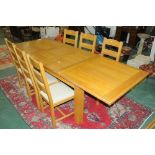 Extending dining table and 6 ladder back chairs with upholstered seats