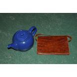 Blue teapot and handbag
