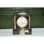 A Victorian marble and slate mantle clock