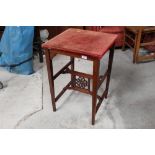 An Edwardian red velvet topped square occasional table,
