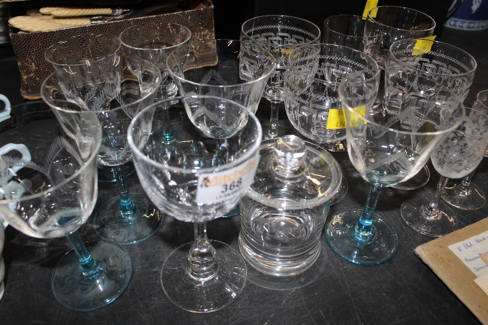 A small group of etched glass ware