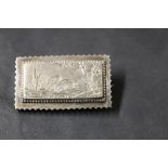 A Victorian white metal rectangular brooch engraved with a swan