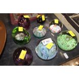 A group of 8 glass paperweights and bird