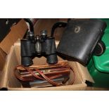 A box of Boots Admiral II binoculars and lady's hand bag