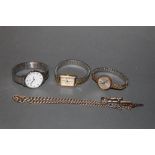 A silver watch chain with T bar and watch key, an Accurinst wristwatch,