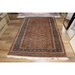 An eastern fringed patterned rug,