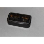 An early 19th century black papier-mache snuff box,