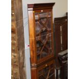 A late 19th / early 20th century mahogany inlaid free standing corner cabinet in 2 sections and
