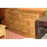 A modern pine sideboard measuring 84 cm tall x 140 long