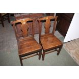A pair of 19th century oak splat back dining chairs