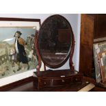 An Edwardian mahogany oval dressing table mirror with 3 drawers