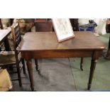 A William IV mahogany occasional table raised on tulip carved legs measuring 73 cm tall and 106 cm