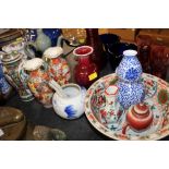 A collection of oriental items to include a blue and white double gourd shaped vase