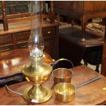 A brass electrified lamp and sold together with miniature pan and jam pan