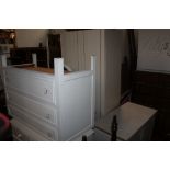 4 pieces of white bedroom furniture to comprise a chest of drawers and dressing table mirror,