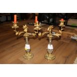 A pair of gilt metal and glass 2 branch candelabra