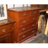 An early 20th century walnut 2 over 3 chest of drawers measuring 105 cm x 104 cm