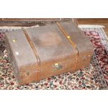 A late Victorian canvas and wood bound travelling trunk,