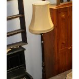 A modern standard lamp with gold coloured shade measuring 188 cm tall