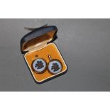 A pair of Wedgwood gold plated and jasper ware cufflinks, with circular faces,