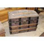 A late 19th century dome top trunk,