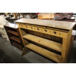 A pierced pine dresser top measuring 114 cm tall x 140 cm wide