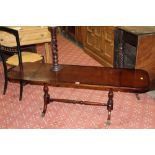 A modern inlaid sofa table and sold together with pricket stand