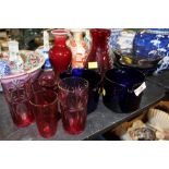 A group of coloured glassware to include cranberry glass