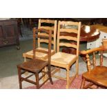 A pair of oak rushed seat dining chairs and Edwardian oak chair