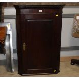 A 19th century mahogany corner cupboard measuring 104 cm tall x 70 cm wide