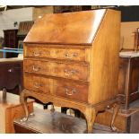A reproduction mahogany fall front bureau with 3 drawers,