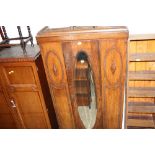 An oak carved mirror door wardrobe with drawer to base and measuring 184 cm tall x 90 cm wide
