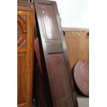 A number of mahogany and other wardrobe doors and panels