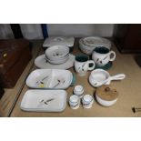 A collection of Denby Greenwheat pattern dinnerware
