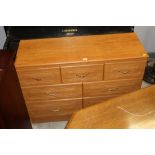 A modern laminated chest of 7 drawers,